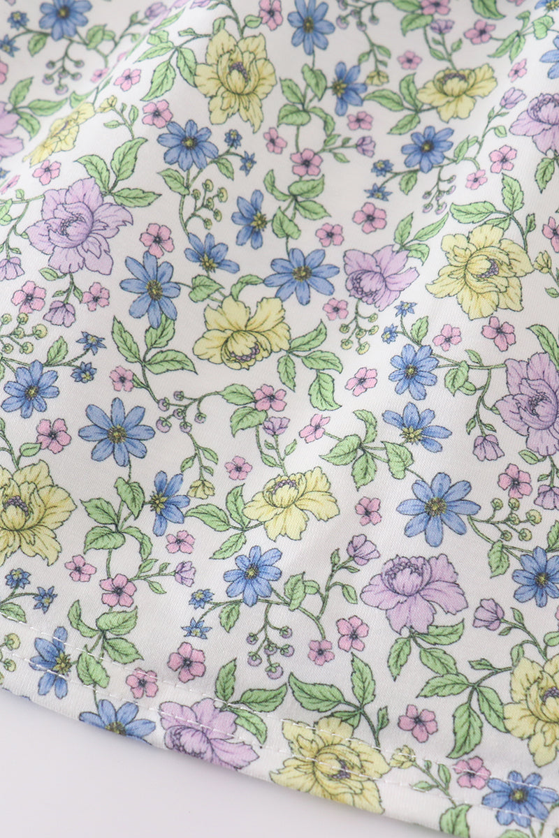 Purple floral girl dress with a bow, perfect for special occasions.