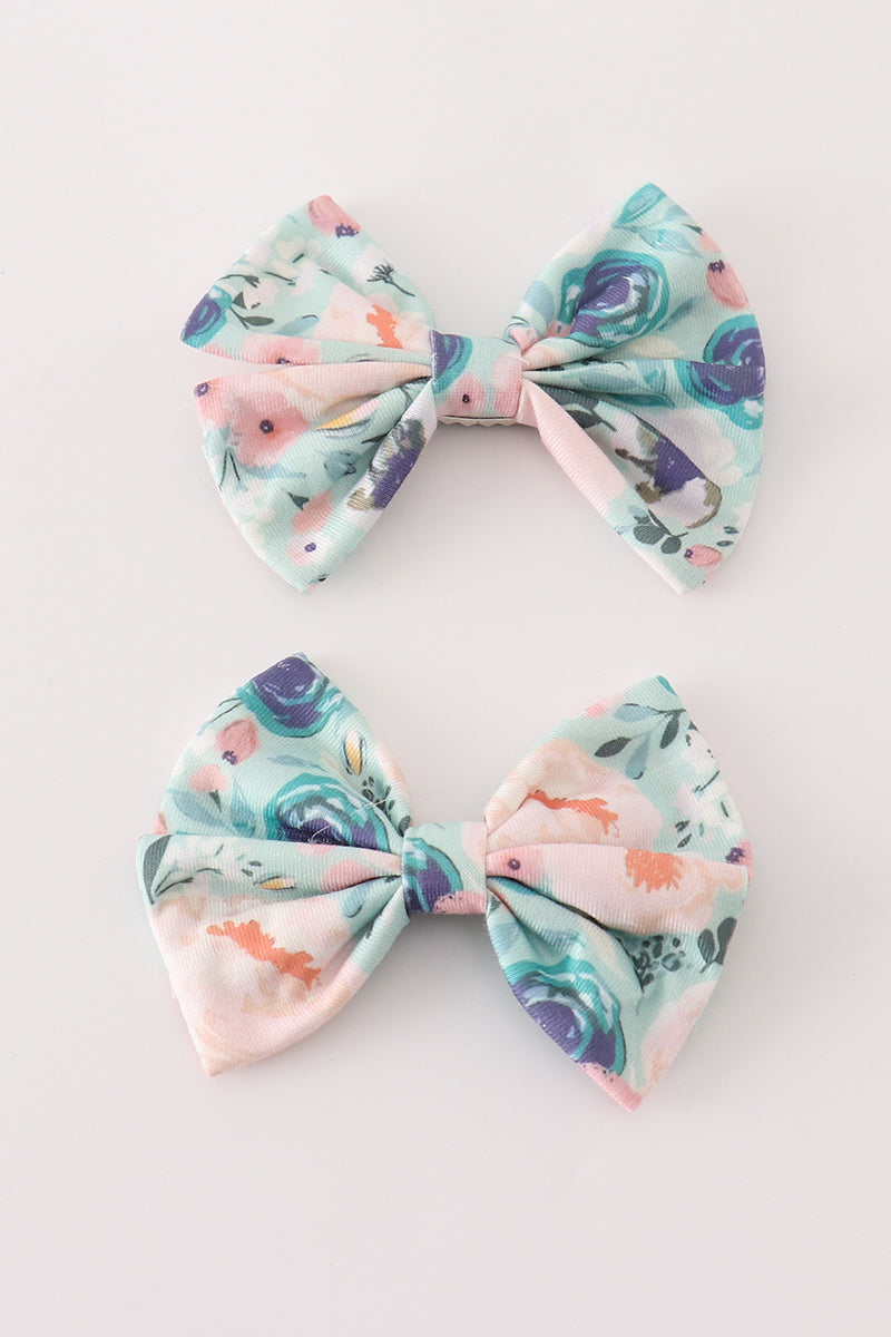Whimsical green garden print girl piggie hair bow, perfect for playful outfits.