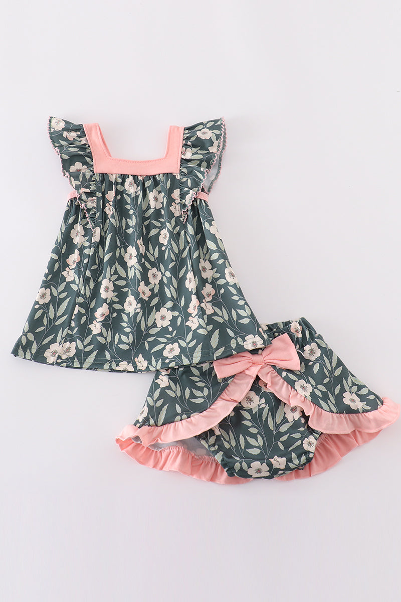 Green forest bloom print girl bloomer set with ruffled sleeves and floral pattern.