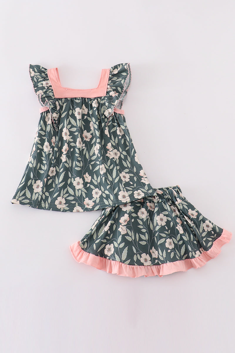 Green forest bloom print girl bloomer set with ruffled sleeves and floral pattern.