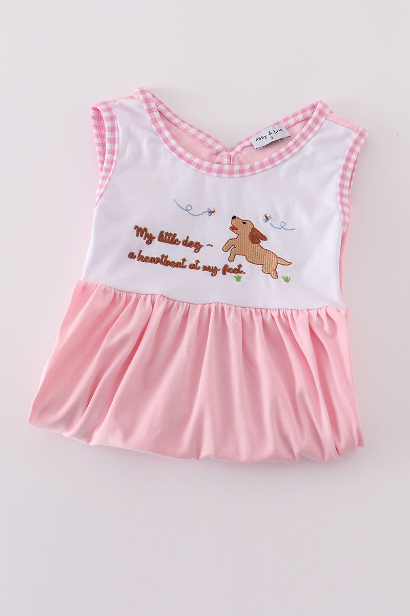 A charming pink dress with adorable puppy embroidery, perfect for little girls.