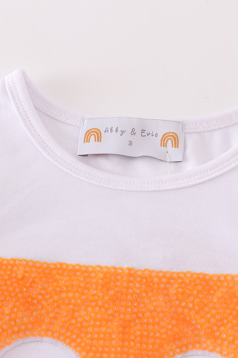 Matching Tennessee sequin tops in vibrant orange with playful sparkle for mom and child.