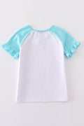 Mint green girl’s top with a whimsical bow print, perfect for playful days.