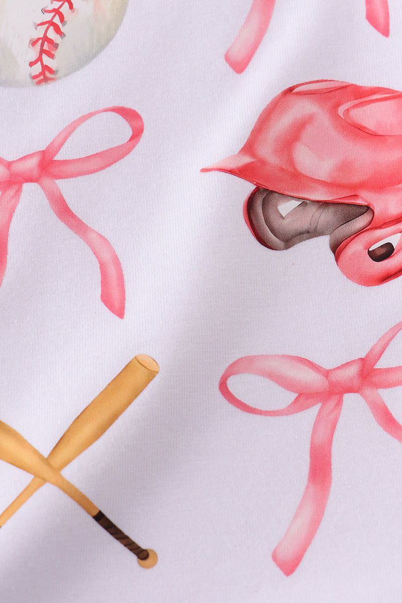 Pink baseball bow tie girl top with playful pattern from Sandilake Clothing.