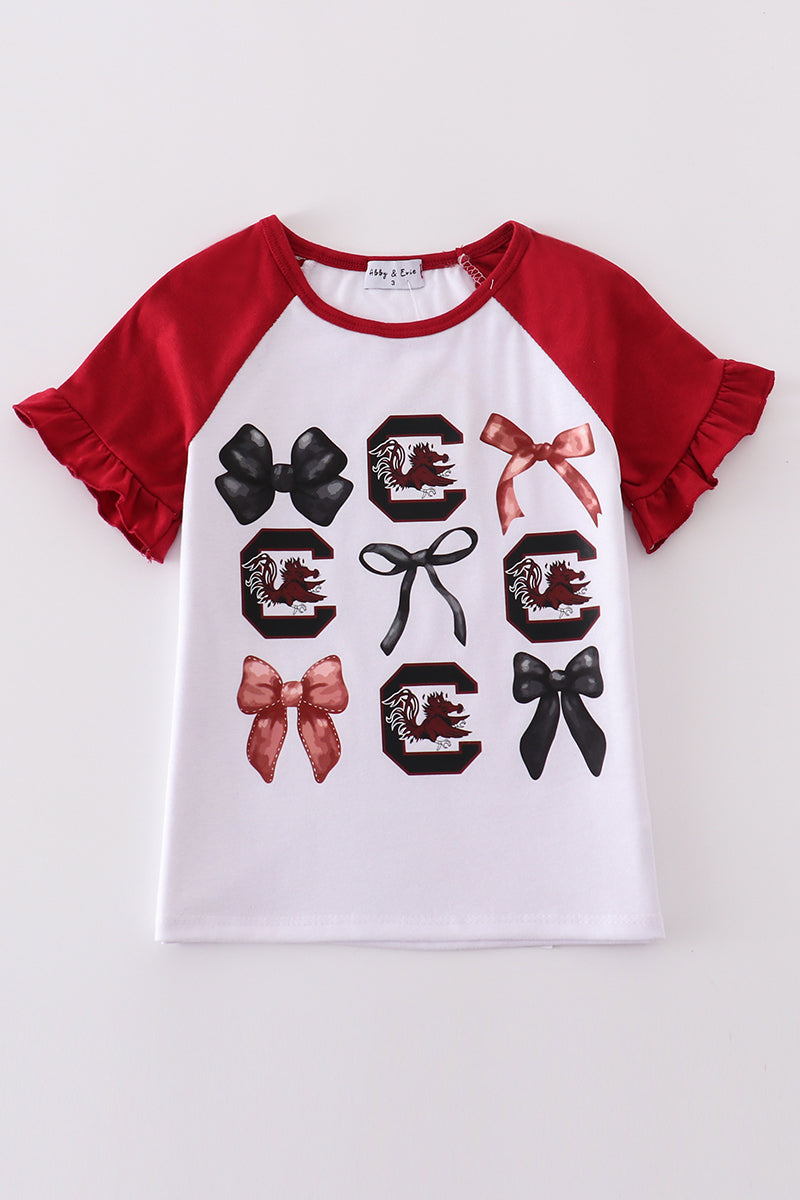 Cheerful girl’s top with colorful South Carolina bow pattern, perfect for playful outings.