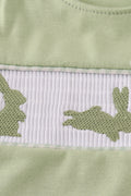 Sage green smocked bloomer set with cute bunny embroidery for toddlers.