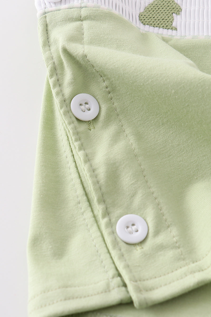 Sage green smocked bloomer set with cute bunny embroidery for toddlers.
