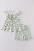 Sage green smocked set with bunny embroidery, perfect for springtime adventures.