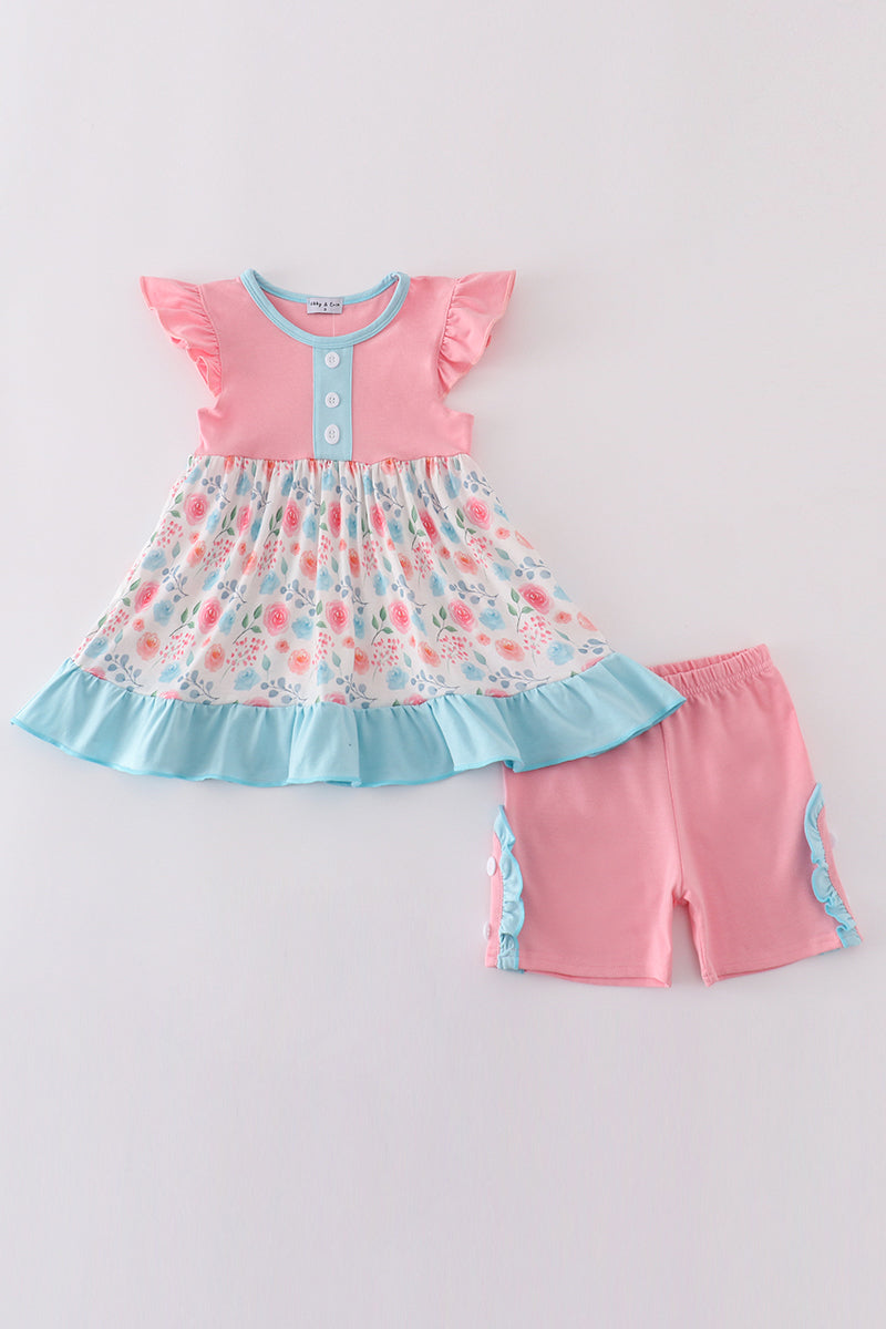 Pink floral print ruffle set with playful flowers, perfect for spring outings.