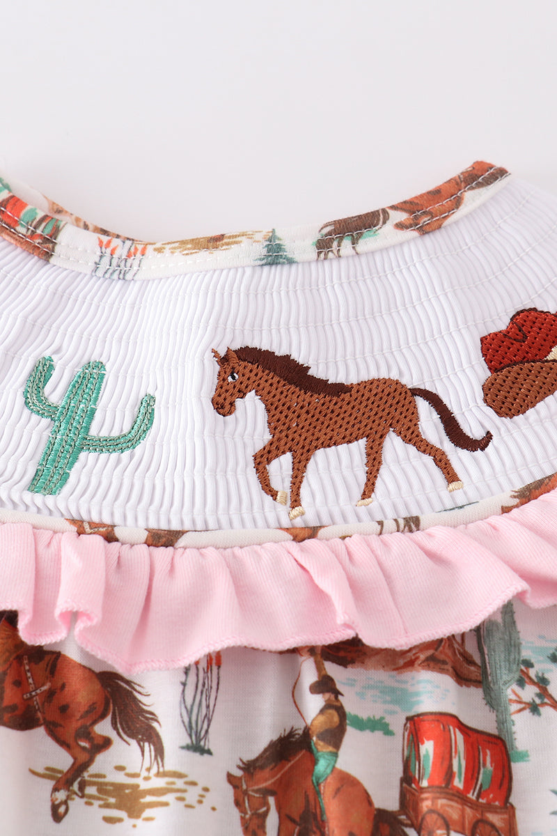 Pink smocked bloomer set with western cowboy embroidery, perfect for playful adventures.