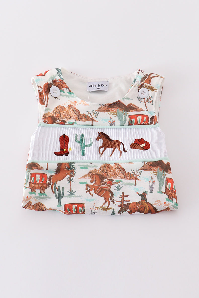 Pink smocked bloomer set with western cowboy embroidery, perfect for playful adventures.