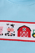 Children's blue smocked shorts set with charming farm animal embroidery.