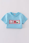 Children's blue smocked shorts set with charming farm animal embroidery.