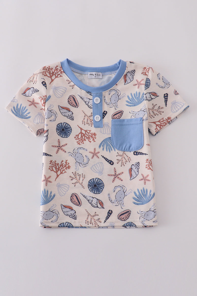 Blue ocean breeze shells print top, perfect for dad and me matching moments.