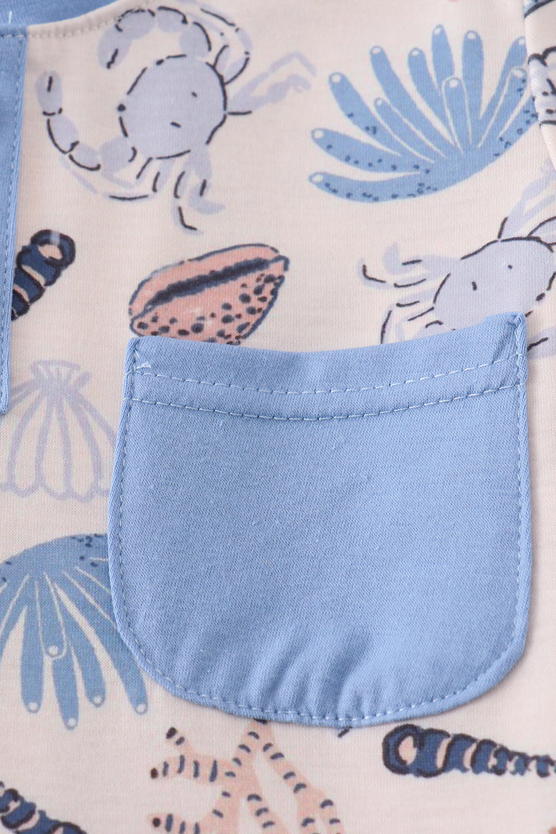 Blue ocean breeze shells print top, perfect for dad and me matching moments.
