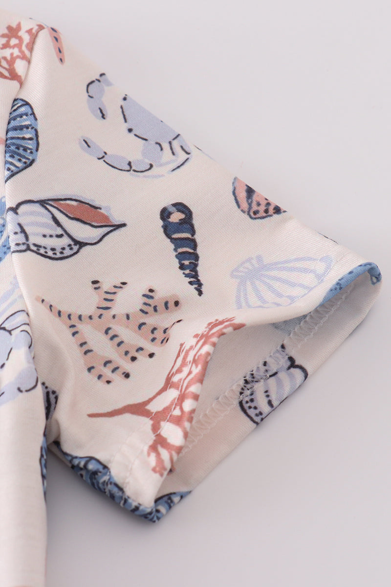 Blue ocean breeze shells print top, perfect for dad and me matching moments.