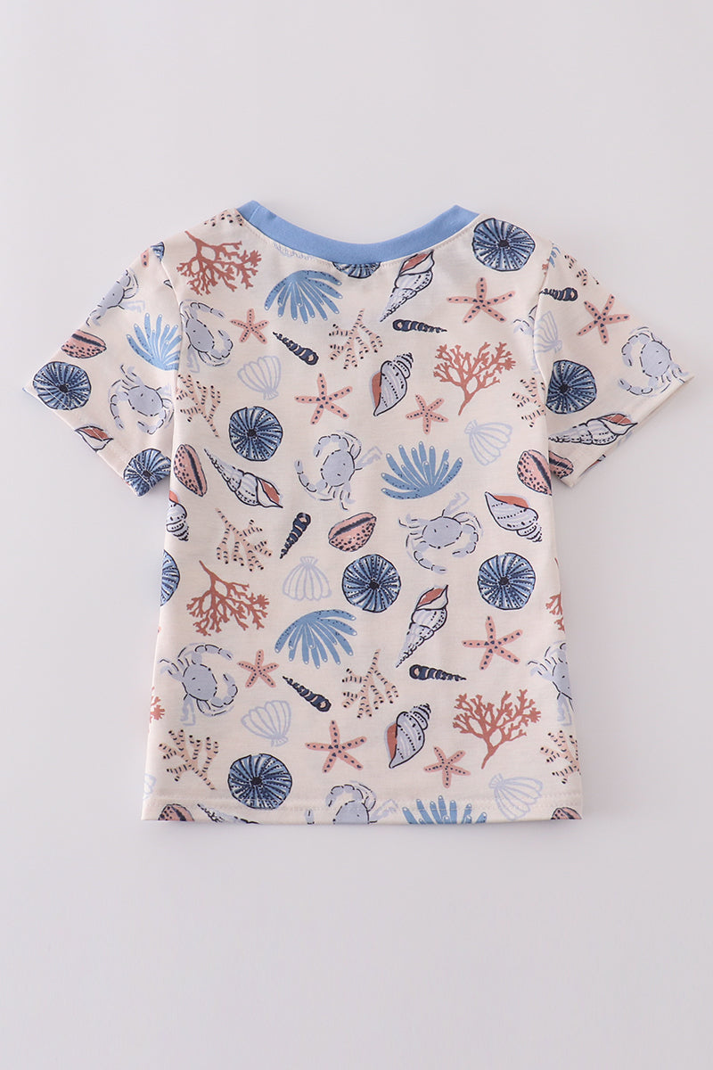 Blue ocean breeze shells print top, perfect for dad and me matching moments.