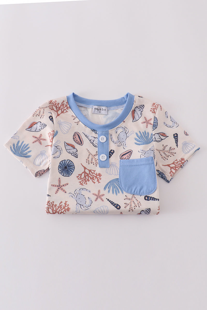 Blue ocean breeze shells print top, perfect for dad and me matching moments.