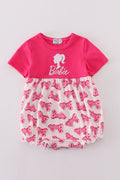 Hot pink bubble romper with Barbie embroidery, perfect for playful adventures.