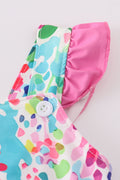 Bright and colorful 2-piece swimsuit with rainbow garden print, perfect for summer fun.