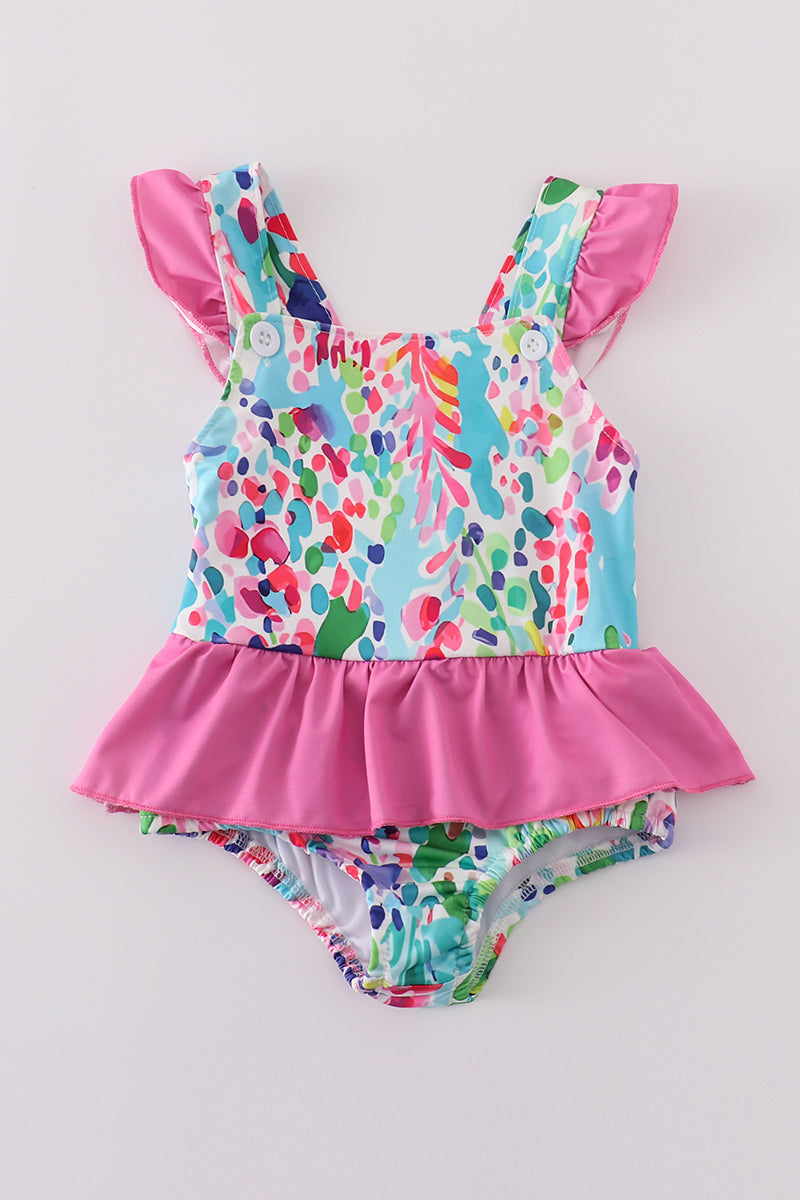 Colorful one-piece swimsuit with a vibrant rainbow garden print, perfect for summer fun.