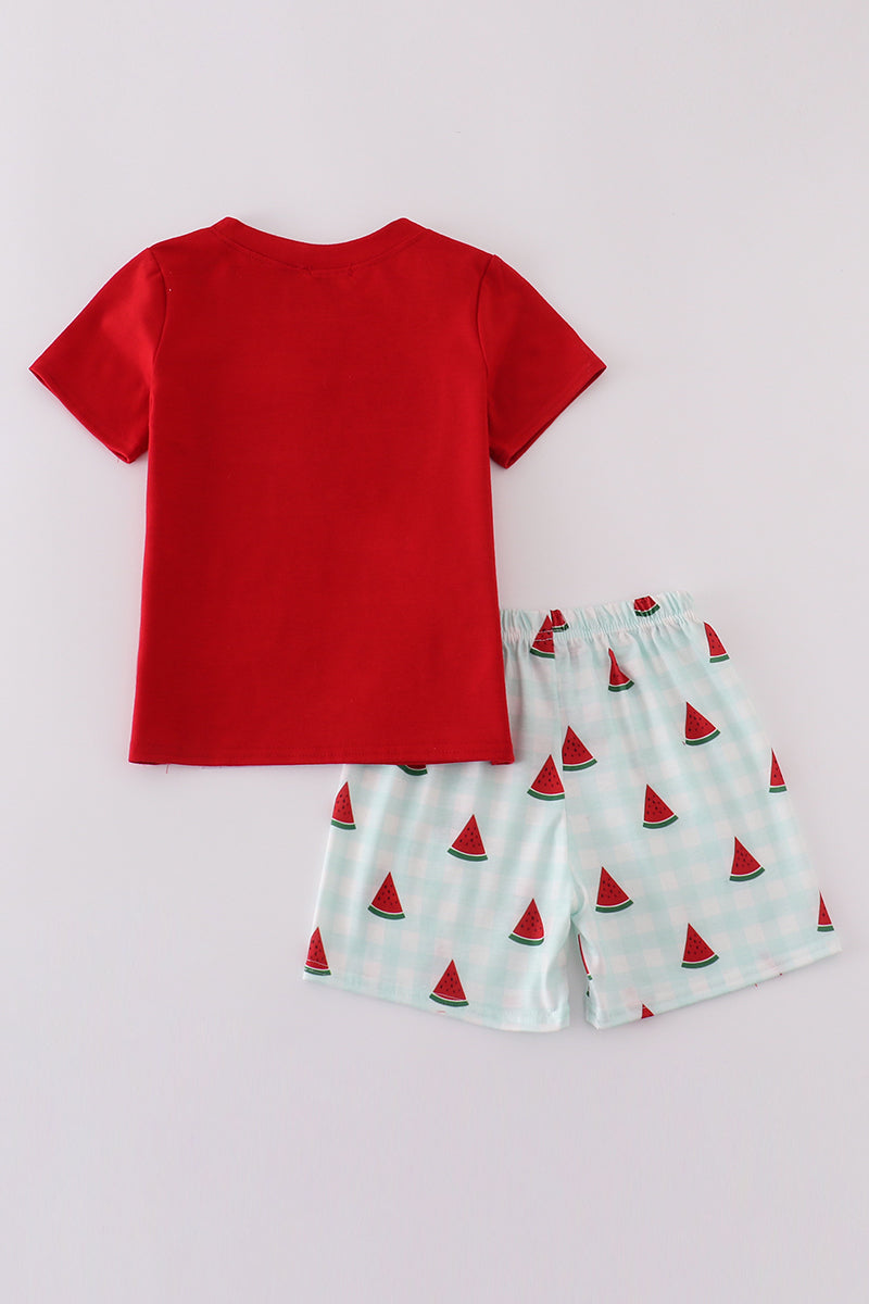 A charming red smocked set with playful watermelon embroidery, perfect for summer fun.