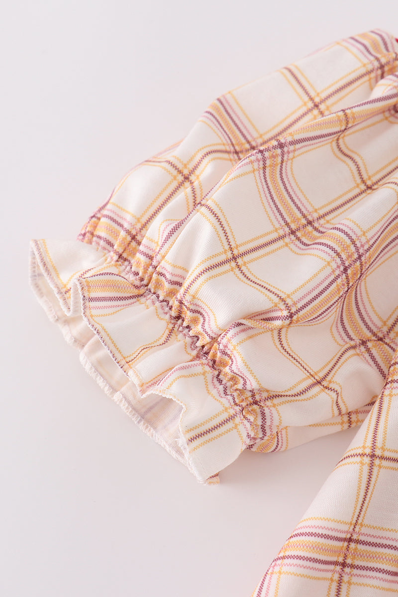 Khaki plaid dress with farm animal embroidery, perfect for playful adventures.