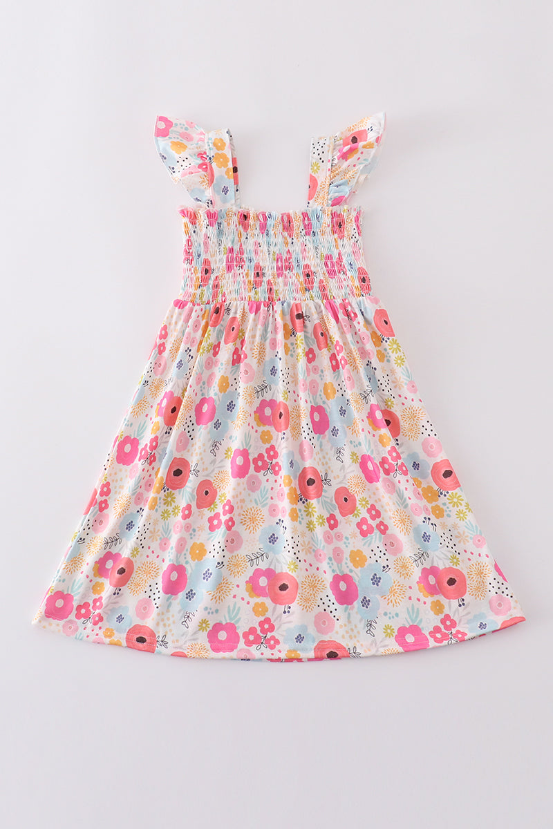 Pink floral print smocked dress with ruffled sleeves, perfect for spring outings.
