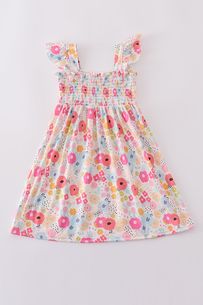 Pink floral print smocked dress with ruffled sleeves, perfect for spring outings.