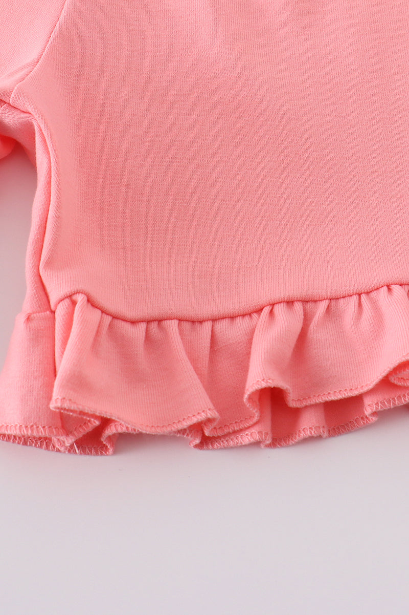 Pink floral print smocked set with ruffled sleeves, perfect for spring outings.