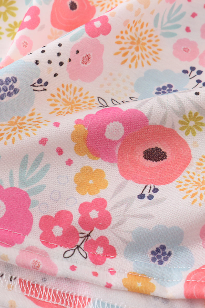 Pink floral print smocked set with ruffled sleeves, perfect for spring outings.