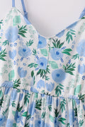 Whimsical floral mom dress with vibrant garden print, perfect for spring outings.