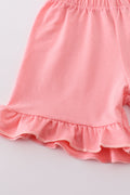 Pink baseball print girl set with playful patterns, perfect for sporty fun.
