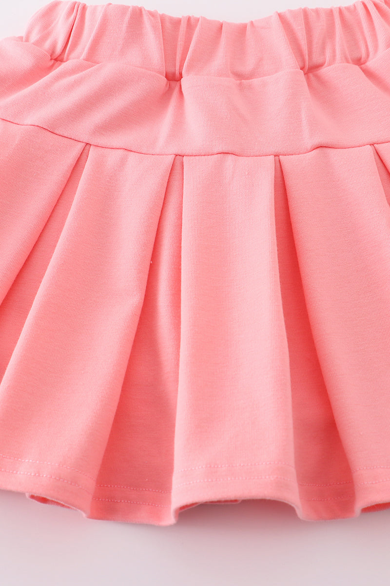 Pink skort set with baseball print, perfect for playful summer days.