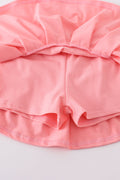 Pink skort set with baseball print, perfect for playful summer days.