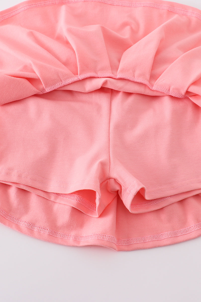 Pink skort set with baseball print, perfect for playful summer days.