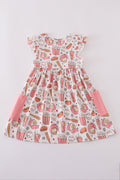 Pink girl dress with fun baseball print, perfect for playful outings.