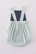 Navy bubble romper with playful puppy birthday applique, perfect for boys.