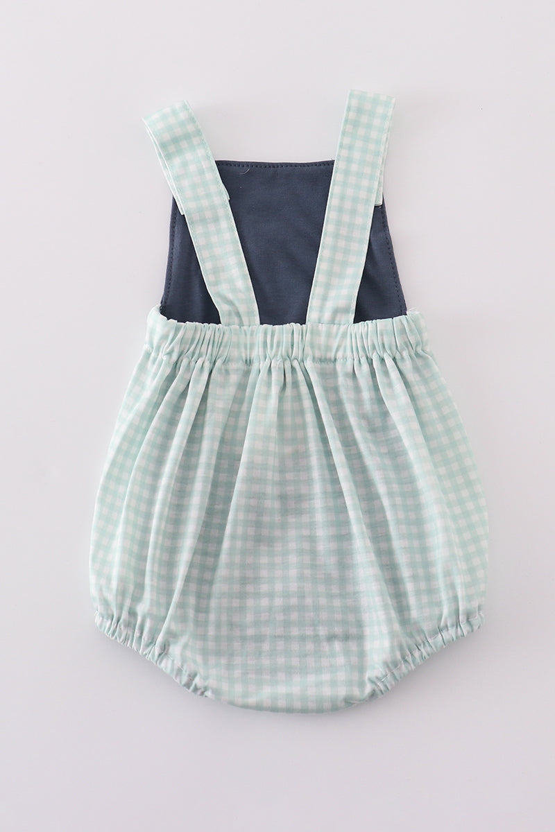 Navy bubble romper with playful puppy birthday applique, perfect for boys.