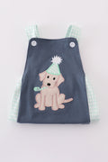 Navy bubble romper with playful puppy birthday applique, perfect for boys.
