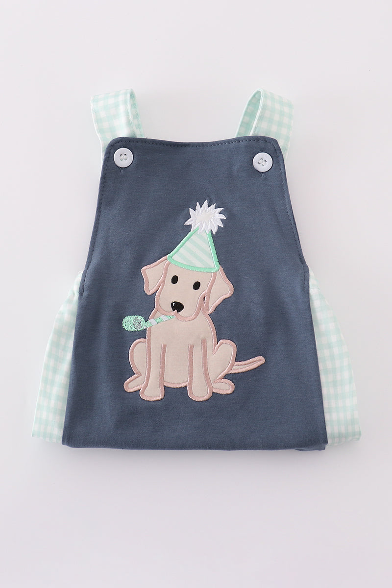 Navy bubble romper with playful puppy birthday applique, perfect for boys.