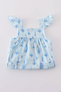 Blue sailboat print girl set featuring a playful nautical design, perfect for summer.