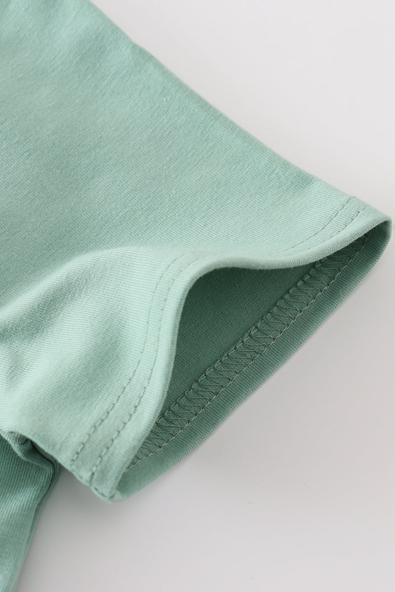 Green boy's outfit with playful chicken applique, perfect for casual playtime.