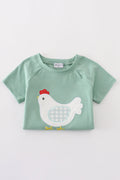 Green boy's outfit with playful chicken applique, perfect for casual playtime.