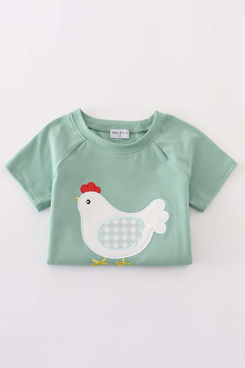 Green boy's outfit with playful chicken applique, perfect for casual playtime.