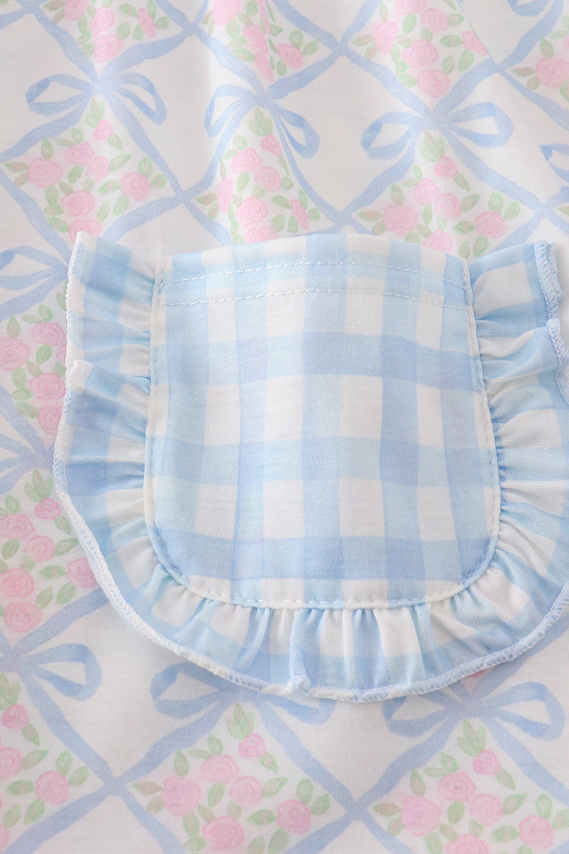 Plaid floral bow print girl set featuring vibrant patterns and playful design.
