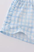 Plaid floral bow print girl set featuring vibrant patterns and playful design.