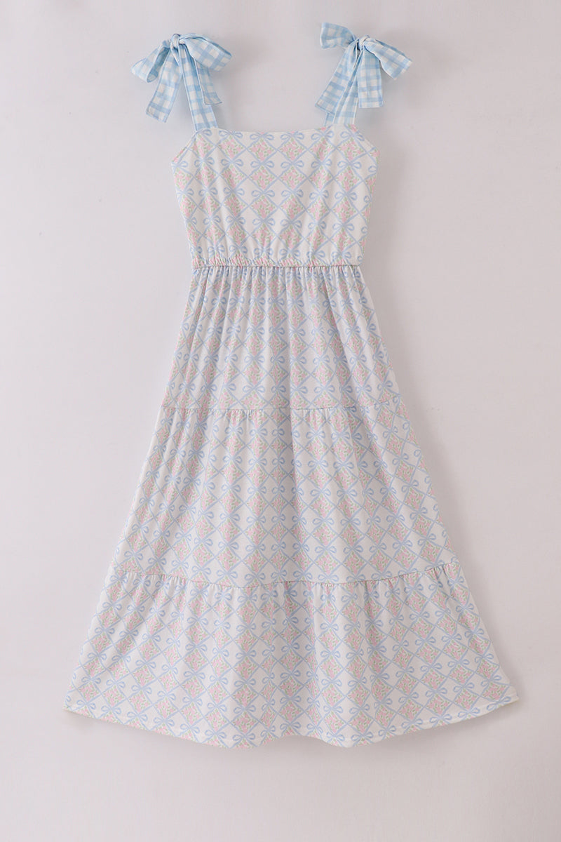 Plaid floral bow print mom tiered dress with vibrant colors and playful design.