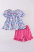 Blue blossom charm smocked girl set with floral pattern, perfect for spring outings.