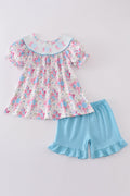 Blue petal meadow embroidery girl set: floral-patterned top and matching shorts.
